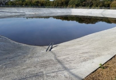 Concrete Lined Waste Holding Pond / Lake County, Illinois